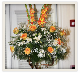 Peach Roses and Gladiolus in a Wedding Stand